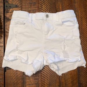 Girls white shorts and pink/green camo shorts